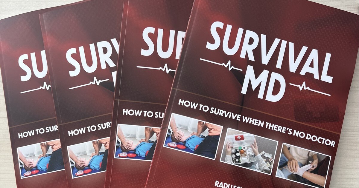 Four copies of the printed Survival MD book by Dr. Radu Scurtu side by side